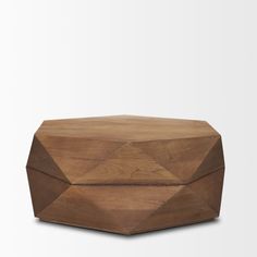 a wooden box sitting on top of a white surface