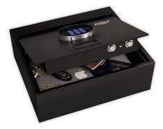 an electronic device in a black box with keys