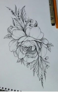 a drawing of flowers and leaves on paper