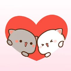 two cats sitting next to each other in front of a heart