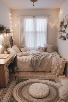 a bedroom with a bed, desk and rug