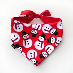 a red bandana with snowmen on it