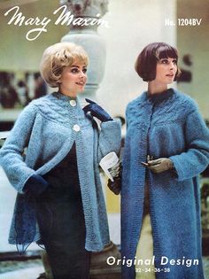 two women in coats and gloves are standing next to each other