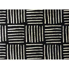 a black and white rug with lines on it