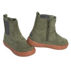 Step into style and comfort with our chic Chelsea boot, designed for both fashion-forward flair and all-day wear! Featuring a soft interior jersey lining, these boots ensure a comfortable fit that keeps your little one’s feet happy from morning to night. The durable rubber sole offers traction and stability on any surface, while the side zip allows for easy dressing on the go. With a convenient heel loop for effortless removal, these boots are both practical and stylish. Plus, the printed elastic insert adds a pop of personality to every step! Pack includes one pair of Chelsea boots. | Modern Moments™ by Gerber Infant & Toddler Boys Dark Green Chelsea Boot - 7 Easy Dressing, Stylish Plus, Boots Fall, Christmas 2024, Chelsea Boot, Simple Dresses, Toddler Boys, Side Zip, Chelsea Boots