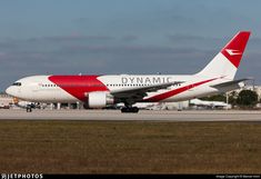 a large passenger jet sitting on top of an airport runway