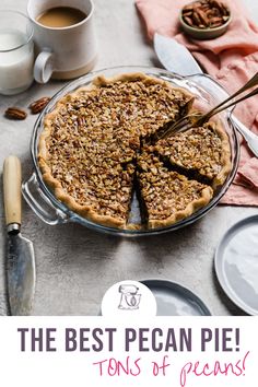 the best pecan pie tons of pecans on this table with two cups of coffee