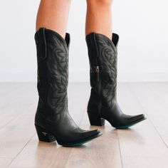 She's a timeless renegade. A jet-black cowgirl boot right off the runway. This classic snip toe is accompanied by an abstract cosmic starburst pattern and retro-inspired toe stitch. Level up your wardrobe and pair this blue-bottom hottie with your favorite little black dress. Heel Height: 2.25" Shaft Height: 15" Calf Circumference: 14" Ankle Circumference: 12" Toe Shape: Snip Signature Turquoise Soles Dark Brown Cowgirl Boots, Womens Black Cowboy Boots, Brown Cowgirl Boots, Black Cowgirl Boots, Lane Boots, Black Cowgirl, Jet Black Color, Black Cowboy Boots, Space Cowboy