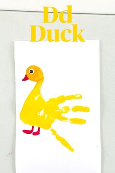 a yellow duck handprinted on a white paper with the words dad duck written in it