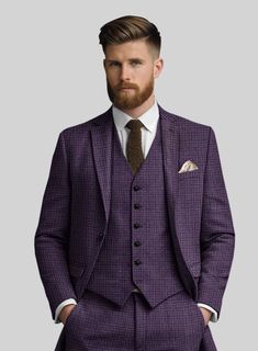 Exude your authentic fashion style with our Italian Purple Houndstooth Tweed Jacket. Crafted from a luxurious wool blend, its majestic purple shade, intricately woven with a houndstooth pattern, seamlessly blends classic allure with modern sophistication. The jacket's graceful draping promises unparalleled comfort while preserving an air of refinement. Whether amidst the glimmering lights of a gala or the hushed ambiance of a private club, this jacket will be your companion.  Look features a 2 button jacket with notch lapels, horn royal black buttons, single vent and three cuff buttons.   Click 'Customize Now' to modify the look if needed.   Lining: Viscose. Tailored Tweed Blazer With Houndstooth Pattern, Tailored Wool Tweed Jacket With Houndstooth Pattern, Tweed Blazer With Houndstooth Pattern, Elegant Tweed Outerwear With Houndstooth Pattern, Semi-formal Houndstooth Tweed Jacket With Suit Collar, Semi-formal Tweed Jacket With Houndstooth Pattern And Suit Collar, Semi-formal Tweed Jacket With Houndstooth Pattern, Semi-formal Houndstooth Tweed Jacket, Elegant Purple Suits For Fall