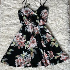 Cute And Fun Floral Flare Dress. Great For Wearing Casual With A Pair Of White Tennis Shoes Or Is Easily Dressed Up For Any Special Occasion. Sparkly Short Dress, Vamp Dress, Floral Print V-neck Fit And Flare Midi Dress, Black Floral Print V-neck Dress For Summer, Womens Velvet Dresses, Floral Print Fit And Flare Mini Dress With V-neck, Black Floral Print V-neck Summer Dress, Chic Floral Print V-neck Mini Dress, White Tennis Shoes