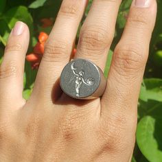 This signet ring is cast in lead-free pewter. The ring size when cast is 7.25. The sealing image is the sun and moon orbiting a figure.       This is part of a series of signet rings I am making cast from lead-free pewter. Each master ring is hand sculpted to give a unique, rustic style, multi-dimensional relief image when used as a stamp to seal, with sealing wax. Symbolic Round Hand Cast Signet Ring, Moon Orbit, Moon Circle, The Sun And Moon, Sealing Wax, Circle Ring, Signet Rings, Wax Seal, Sun And Moon