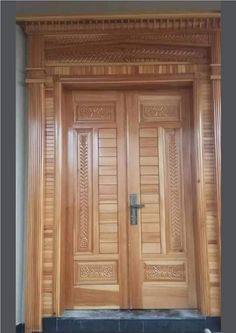 two wooden doors with carved designs on the front and side panels, one is open