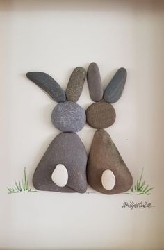 some rocks are arranged in the shape of rabbits