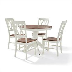 a white table with four chairs around it