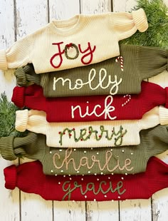 four christmas sweaters with the words joy, holly, nick, merry and charlie gravy on them