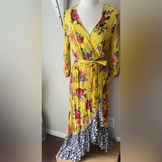 Farm Rio For Anthropologie Maxi Dress. Yellow/ Gold And Floral Wrap Dress And Asymmetrical Hem. Farm Rio Maxi Dress, Farm Rio Wrap Dress, Yellow Tropical V-neck Maxi Dress, Anthropologie Maxi Dress, Farm Rio Romper, Multicolor Vibrant Print V-neck Maxi Dress, Farm Rio, Wrap Dress Floral, Asymmetric Hem