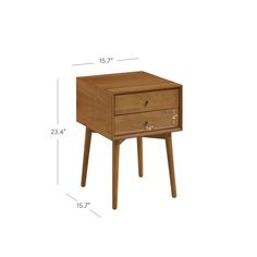 the side table has two drawers on one end and an open drawer on the other