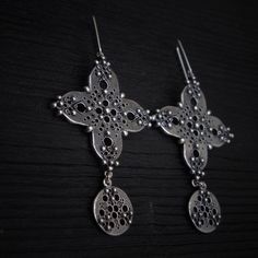 Dear costumer, please notice the time of delivery can change due to weather, situation in the destination country, and due to other reasons. Long dangling earrings made of sterling silver (925). Cross shaped earrings with round pendant. They look truly gorgeous with every outfit! Approx. weight - 15.6 gr. This jewelry you will receive in a gift box, so you can give it to your loved one right away. 3-5 business days order processing time Free shipping includes standard 10-15 business days deliver Artisan Sterling Silver Chandelier Earrings Nickel Free, Artisan Sterling Silver Nickel-free Chandelier Earrings, Silver Long Drop Earrings With Oxidized Finish, Silver Oxidized Long Drop Jewelry, Oxidized Sterling Silver Dangle Earrings, Sterling Silver Oxidized Dangle Earrings, Unique Silver Sterling Chandelier Earrings, Elegant Oxidized Sterling Silver Danglers, Silver Long Drop Jewelry With Oxidized Finish