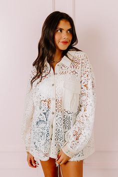 - Stay in a boho state of mind with this unique top! - Unlined crochet material featuring cream, white and ivory panels of different abstract patterns - Soft subtly textured accents - A collared - A button closure front - A functional chest pocket - Long sleeves with button closure cuffs featuring pink, blue, and purple hued accents with neutral hued sequins - A relaxed silhouette that ends in a straight hemline Measurements S : Bust 44", Hip 48", Length 28", Sleeve Length 22", Waist 46". M : Bu White Crochet Top With Lace Collar, White Crochet Lace Top For Day Out, Chic White Crochet Lace Top, Cream Lace Top With Crochet Details, White Lace Top With Patchwork For Day Out, White Lace Top For Day Out, Cream Bohemian Tops With Lace Patchwork, Bohemian Cream Crochet Top With Crochet Trim, White Bohemian Cotton Lace Top