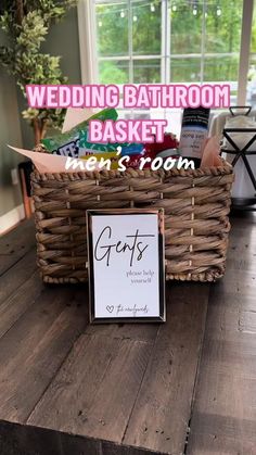 a wooden table topped with a basket filled with books next to a sign that says get's