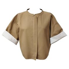 Cotton (99%) and silk (1%) Beige color Short sleeve with revers Hidden zip closure Shoulder/hem length cm 48 (188 inches) French size 40 italian 44 Color Shorts, Jil Sander, Beige Color, Blazer Jacket, Blazer, Fashion Outfits, Silk, Clothes, Color