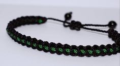 Black braided bracelet with a  green Line, adjustable wristband -new -handmade -for man & woman Green Casual Bracelets With Adjustable Cord, Green Casual Bracelet With Adjustable Cord, Green Adjustable Jewelry For Friendship, Casual Green Bracelet With Sliding Knot, Casual Green Braided Jewelry, Adjustable Green Friendship Bracelets, Green Beaded Bracelets With Adjustable Cord For Friendship, Handmade Green Adjustable Braided Bracelets, Handmade Adjustable Green Braided Bracelet