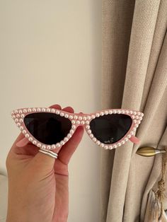 These pearl cat's eyes sunglasses  are one of the top 2023 wedding trends and will add that fun element to your special day. These glasses can also be used for birthdays, hen party's and special occasions! Elegant Pink Sunglasses For Party, Elegant Pink Party Sunglasses, Fun Cat Eye Sunglasses For Party, Fun Cat Eye Sunglasses For Parties, Elegant Pink Cat Eye Sunglasses For Party, Elegant Cat Eye Sunglasses For Summer Party, Pink Sunglasses For Summer Party, Pink Tinted Sunglasses For Party, Elegant Plastic Cat Eye Sunglasses For Party