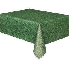 a table covered with green grass