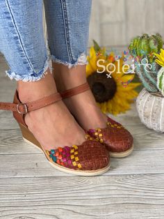 Beautiful leather Mexican Artisanal sandal. These are the highest quality in Artisanal leather sandals. They are completely made by hand, making them one of a kind! These beautiful shoes can be worn with a dress or with jeans, either way you will look stylish and unique! How to order your size: Example, If you wear a size 7.5 order a 7. If you are a size 7 order a 7. The sandal will mold to your feet with use, they stretch. Please note: You may exchange your shoe size. If you need to exchange yo Bohemian Leather Wedge Sandals, Leather Bohemian Wedge Sandals, Bohemian Brown Leather Wedge Sandals, Bohemian Leather Heels For Festival, Bohemian Leather Sandals With Wedge Heel, Bohemian Leather Wedge Heel Sandals, Traditional Leather Sandals With Wooden Heel, Bohemian Leather Heels With Wooden Heel, Multicolor Leather Wedge Sandals With Ankle Strap