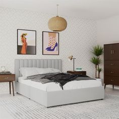 a bedroom with a bed, nightstands and pictures on the wall above it that have been decorated in modern style