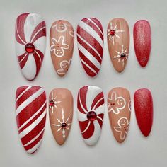 Get festive with our Christmas Gingerbread Candy Cane Glitter Press On Nails! These handmade, reusable nails combine red and brown tones with cute gingerbread and candy cane designs. Perfect for a fun, custom holiday look in short or long styles! 🌸Thank you for supporting my small business.🌸 You can reuse all the nails you purchased from us multiple times, if you handle them with care 📦𝐖𝐡𝐚𝐭 𝐜𝐨𝐦𝐞𝐬 𝐰𝐢𝐭𝐡 𝐲𝐨𝐮𝐫 𝐩𝐫𝐞𝐬𝐬 𝐨𝐧 𝐧𝐚𝐢𝐥 𝐤𝐢𝐭? 10 𝘯𝘢𝘪𝘭𝘴 𝘰𝘧 𝘺𝘰𝘶𝘳 𝘴𝘪𝘻𝘦 Christmas Candy Cane Nails, Candy Cane Nail Art, Nail Noel, Glitter Press On Nails, Candy Cane Nails, Candy Cane Stripes, Winter Nail, Festival Nails, Red Candy