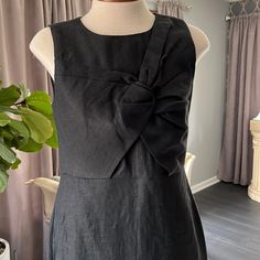 Black Linen Fully Lined Dress With Draping In The Front. Shift Silhouette, Hits Just At Mid Knee, Zipper In The Back. Black Fitted Midi Dress With Bow, Black Midi Dress With Bow For Summer, Black A-line Dress With Bow, Black Bow Midi Dress For Summer, Dress With Draping, Sleevless Dress, Cotton Tunic Dress, Elastic Waist Dress, Midi Wrap Dress