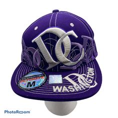 City Hunter Brand Washington DC Purple and white fitted baseball hat Medium Acrylic Curved Bill Hats For Baseball Season Streetwear, Hip Hop Snapback Hat For Baseball Season, Hip Hop Fitted Hat For Baseball Season, Hip Hop Style Fitted Hat For Baseball Season, Curved Brim Snapback Hat For Baseball Season, Fitted Hats For Streetwear, White Hip Hop Fitted Baseball Cap, Hip Hop Flat Bill Baseball Cap For Baseball Season, Hip Hop Style Baseball Cap With Curved Brim