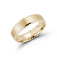 a yellow gold wedding ring on a white background