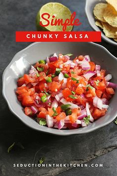 a white bowl filled with salsa next to tortilla chips