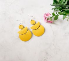 bright yellow stacked half moon and moon shape leather earrings Trendy Yellow Earrings For Everyday, Trendy Yellow Everyday Earrings, Chic Yellow Earrings For Summer, Chic Yellow Earrings For Gift, Chic Yellow Earrings For Spring, Modern Yellow Earrings For Everyday, Modern Yellow Earrings For Everyday Wear, Brass Hooks, Muslin Bags