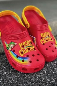 Step up your shoe game with these lucky charm themed Crocs! Whether you're feeling lucky or just want to add some charm to your day, these shoes are sure to bring a smile to your face. Featuring colorful designs of horseshoes, four-leaf clovers, and other lucky symbols, these Crocs will help you stand out from the crowd. And with the comfort and durability you expect from Crocs, you'll be able to wear them all day long without missing a beat. #affiliate #crocs #luckycharms Clog Crocs Outfit, Themed Crocs, Charms Crocs, Clog Crocs, Lucky Symbols, Feeling Lucky, Outfit Red