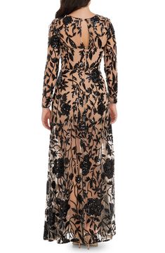 Sparkle from head to toe in this gorgeous floral mesh gown richly embroidered with shimmery sequins for an ultraglam look. 59" length Hidden back zip; keyhole with button-and-loop closure Jewel neck Long sleeves Partially lined 100% polyester Hand wash, dry flat Imported Black Floral Embroidery Maxi Dress For Evening, Black Embroidered Maxi Gown, Black Floral Embroidery Evening Dress, Semi-stitched Long Sleeve Floral Embroidered Gown, Black Floral Embroidery Floor-length Dress, Mesh Gown, Maxi Lace Skirt, Long Sleeve Gown, Dress The Population