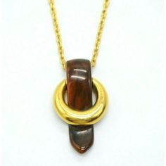 CROWN TRIFARI Gold Tone Brown Swirl Lucite Buckle Pendant Necklace Modernist Very little wear Length of chain  - 20" Size of pendant - 1.75 by 1" Crown Trifari, Pendant Necklaces, Washer Necklace, Swirl, Jewelry Necklace Pendant, Etsy Accessories, Gold Tones, Accessory Gift, Gift Card