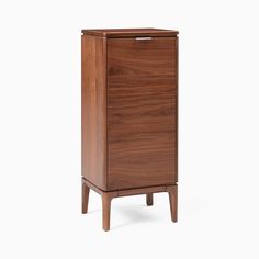 a tall wooden cabinet sitting on top of a white floor