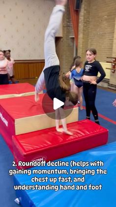 a person is doing tricks on a trampoline