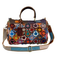 L'Artiste Style: HB-SafariqueFull grain multi colored one-of-a kind satchel with front and side 3-dimensional fantasy gardens and multi colored horizontal leather strips with center zip compartment on back. We love that we can carry forever blossoms with us at all times- Spring into Fall and why not all year long?! Det Fantasy Gardens, Fancy Purses, Artist Bag, L'artiste By Spring Step, Spring Step Shoes, Leather Satchel Handbags, Leather And Canvas, Free Shoes, Leather Flowers