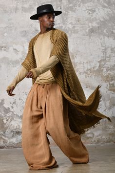 WAFFLE Poncho in Desert Sand - Zhenabia Bohemian One-size Handwoven Cape, Bohemian Handwoven One-size Cape, Bohemian Shawl For Fall Layering, Bohemian Handwoven Poncho For Winter, Fall Handwoven Cape Shawl, Fall Handwoven Shawl Cape, Oversized Brown Bohemian Cape, Oversized Bohemian Shawl With Fringe, Bohemian Wrap Poncho For Winter