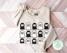 Halloween Sweatshirt, Halloween Shirt, Fall Sweater, Fall Crewneck, Halloween Crewnecks, Fall Crewneck Sweater, Ghost Shirt, Spooky Season Tee, Halloween Sweatshirt Vintage, Halloween Crewneck, Vintage Halloween Crewneck, Fall Apparel, Fall Crewnecks, Fall Sweatshirt, Vintage Halloween, Funny Fall Sweatshirt, Fall Sweater This soft sweatshirt has a loose fit for a comfortable feel. With durable print, it will be a walking billboard for years to come. -Loose fit -50% Cotton; 50% Polyester (fibre Spooky Sweatshirt, Fall Crewneck, Funny Fall, Fall Apparel, Ghost Sweatshirt, Halloween Crewneck, Crewneck Vintage, Spooky Cute, Sweatshirt Halloween