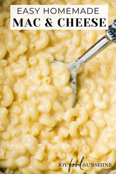 macaroni and cheese being stirred in a pot