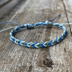 This lovely anklet/bracelet was made with waterproof cord. Designed for everyday wear.  It has an adjustable bead closure that will fit a regular wrist 7-7.5" and open to around 13" to fit as an anklet. Please feel free to contact me if you have any questions. Adjustable Blue Beaded Bracelet With Waxed Cord, Bohemian Blue Waxed Cord Bracelet, Beach Beaded Bracelets With Sliding Knot, Blue Bohemian Braided Bracelets With Waxed Cord, Casual Beaded Bracelets With Nylon Cord For Beach, Blue Beaded Bracelets With Adjustable Cord For Festival, Adjustable Beaded Bracelets With Sliding Knot, Blue Waxed Cord Braided Friendship Bracelets, Blue Braided Bracelet With Adjustable Cord For Festivals