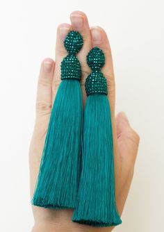 Green long tassel earrings. Ideal for parties and everyday wear. Silk tassel earrings made of high quality beads and silk threads. If you want to look impressive at the event, birthday party, wedding, so this tassel earrings suitable like no other. This tassel earrings are very light. CUSTOM ORDER It is Fully HANDMADE earrings and if you want to purchase this earrings in a different color or size, send me please a direct message. If you have any questions don't be hesitate to ask me. Please visi Thread Tassel Earrings, Green Tassel Drop Earrings As Gift, Party Dangle Tassel Earrings With Latkans, Party Tassel Drop Earrings With Latkans, Party Latkan Tassel Drop Earrings, Green Tassel Drop Earrings For Party, Green Drop Tassel Earrings For Party, Green Tassel Earrings For Party, Elegant Green Dangle Tassel Earrings