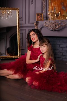 Mommy and Me Dress, Mother Daughter Matching Dress, Formal Photoshoot Dress Feel like a gueen and princess in this adorable trendy hi low burgundy dresses with tulle multilayered bottom with train and removable bow, open back and lace top part With this high low tulle dress with open back you will have many compliments. Dresses can be worn with heels, flats or even sneakers. Different colors and color combinations are possible. SIZES AND CUSTOMISATION Dresses are tailored to order in any standar Fitted Tutu Dress For Christmas Fancy Dress, Fitted Christmas Tutu Dress For Fancy Dress, Sleeveless Christmas Tutu Dress, Elegant Christmas Tutu Dress For Holiday, Elegant Christmas Holiday Tutu Dress, Fitted Tutu Dress For Holiday Festivities, Fitted Tutu Dress For Festive Holidays, Fitted Tutu Dress For Christmas Holiday, Fitted Red Tutu Dress For Festive Occasions