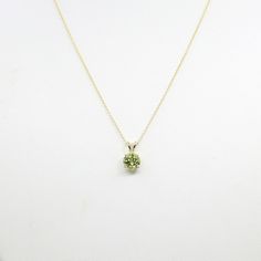 ◈ Diamond Fine Jewelry ◈ ♥ This stunning necklace features 7 mm AAA Natural Peridot. This high quality Peridot can be beautifully set in a solid 14k Yellow gold. This Necklace is perfect for everyday use and can be a lovely gift for any occasion! ♥ ◈ Item Details ◈ --- Handmade in United States --- Made to Order --- Metal: Solid 14K Gold ( White, Rose, Yellow Gold ) --- Pendant Size :12 x7 mm --- 100% Real Natural Peridot --- Stone Size : 7 mm --- Stone Shape : Round --- Total Carat Weight: Appr Dainty Diamond Band, August Birthstone Necklace, Solitaire Necklace, Peridot Pendant, Peridot Necklace, Peridot Stone, August Birthstone, Solitaire Necklaces, Rose Yellow